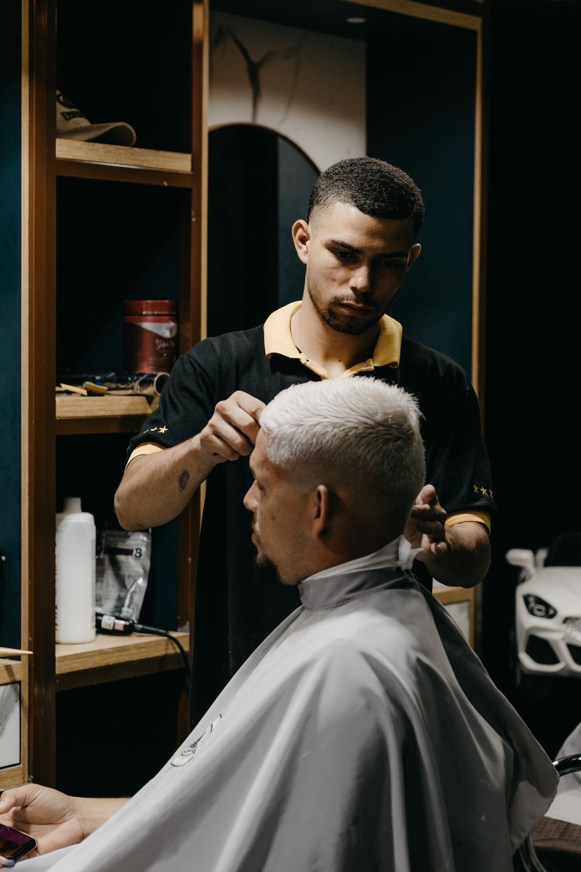 Boy getting haircut